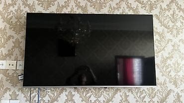 so dimm: Телевизор с тонкими рамками, диагональ около 55–65". Плоская — 1