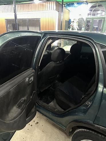 кел кел: Opel Corsa: 2003 г., 1.2 л, Кол менен иштөөчү, Бензин, Хетчбек — 10