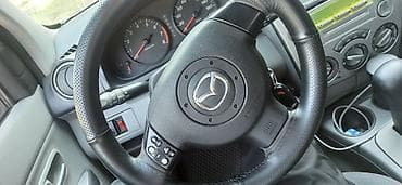 Mazda 2: 2004 г., 1.5 л, Автомат, Бензин, Хэтчбэк — 7