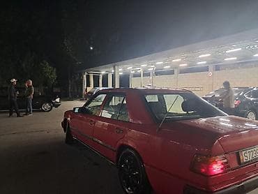 рихтовка спринтер: Красный седан Mercedes-Benz E‑класса (W124) - Кузов: 4‑дверный седан — 8