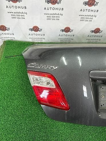 camry xv40: Фонарь крышки багажника левый для TOYOTA Camry (XV40/ACV40), год 2007 — 1