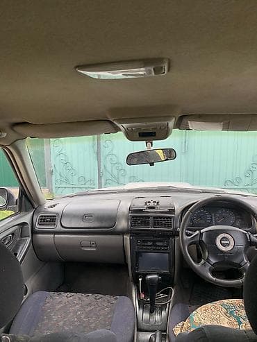 подлокотник аутбек: Subaru Forester: 1997 г., 2 л, Автомат, Бензин, Кроссовер — 5