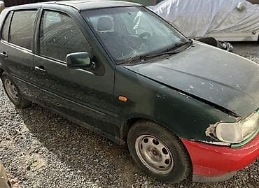 колпачки: Volkswagen Polo: 1993 г., Хэтчбэк — 2