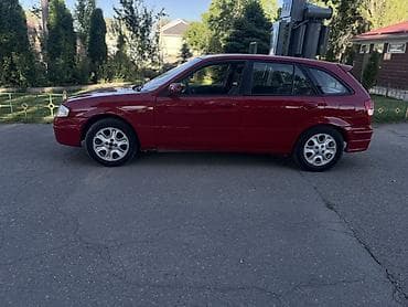 ваз 2112: Mazda 323: 1998 г., 1.5 л, Механика, Бензин, Хэтчбэк — 4