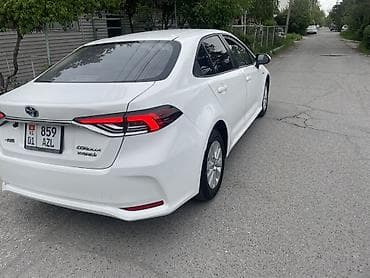 prius 30: Toyota Corolla: 2022 г., 1.8 л, Вариатор, Гибрид, Седан — 4