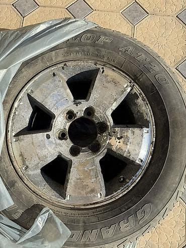 колесо вагон: Диск с шиной для внедорожника/кроссовера. - Шина: Dunlop Grandtrek — 1