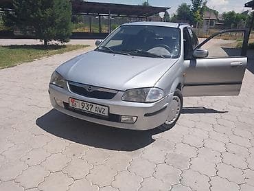 dodje ram: Mazda Familia: 1999 г., 1.6 л, Механика, Бензин, Универсал — 6