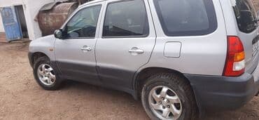 рынок подержанных авто: Mazda Axela: 2002 г., 2 л, Механика, Бензин, Кроссовер — 5
