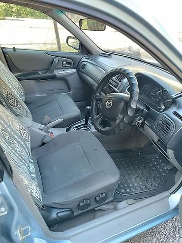 mazda 121: Mazda Familia: 2002 г., 1.5 л, Автомат, Бензин, Универсал — 7
