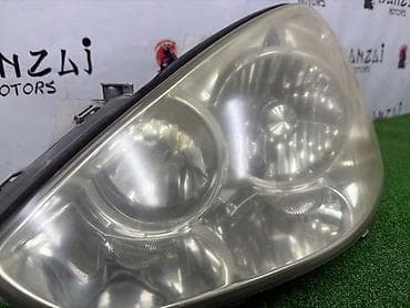 Передняя левая фара Toyota 2003 г., Б/у, Оригинал, Япония — 3