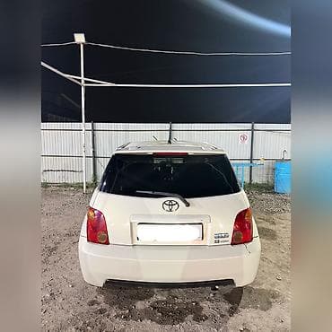 Продажа авто: Компактный TOYOTA IST, 2003, жемчужно-белого цвета Основные — 3