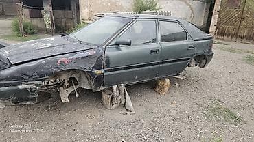 Кузов автомобиля под разбор/на запчасти. - Тип: 4‑дверный седан с