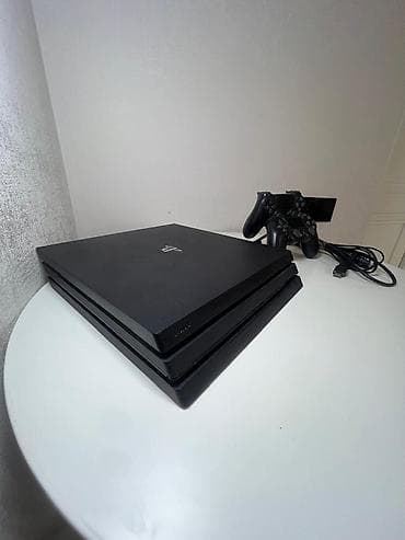 видио игры: PlayStation 4 Pro (черный) Комплектация: - игровая консоль PS4 Pro — 7
