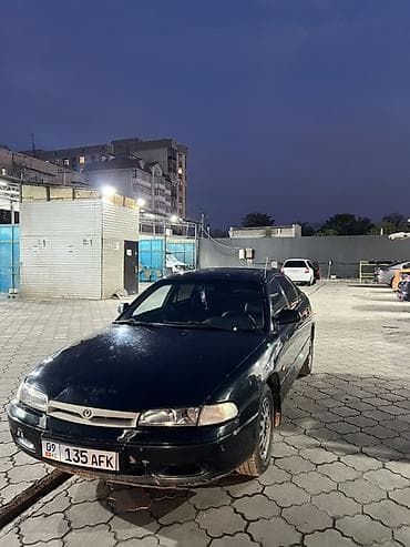 1995: Mazda 626: 1995 г., 1.8 л, Механика, Бензин, Хэтчбэк — 10