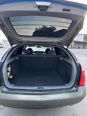 Nissan Primera: 2004 г., 1.8 л, Механика, Бензин, Универсал — 10