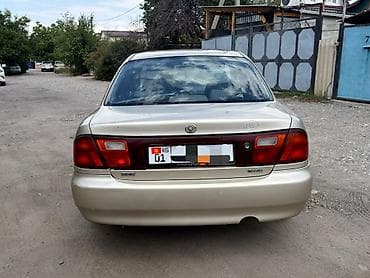 арбитальная машинка: Mazda 323: 1996 г., 1.5 л, Автомат, Бензин, Седан — 4