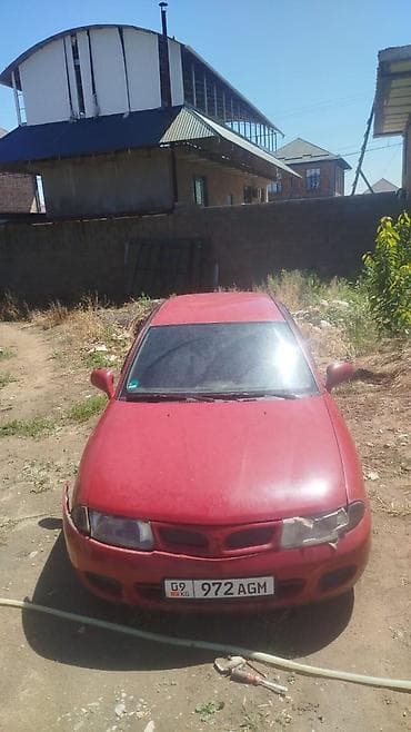 венто 1998: Mitsubishi Carisma: 1998 г., 1.8 л, Автомат, Бензин, Седан — 1