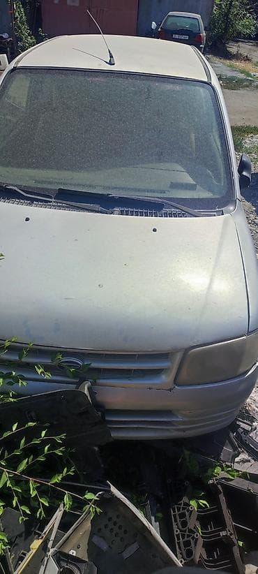 step 2: Daihatsu Cuore: 2000 г. — 2