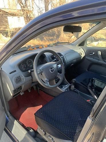 мазда xsedos: Mazda Familia: 2001 г., Механика, Бензин, Универсал — 10