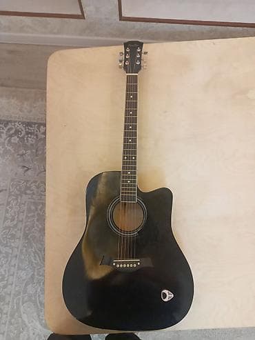 Музыкальные инструменты: Электроакустическая гитара, корпус дредноут с вырезом (cutaway) — 1