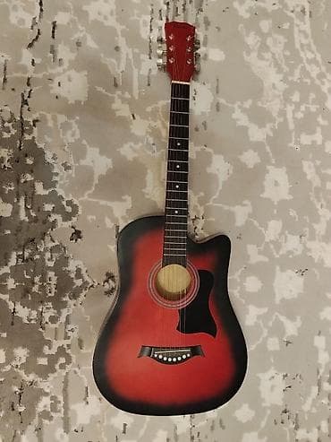 Акустическая гитара Linda, форма дредноут с вырезом (cutaway). -