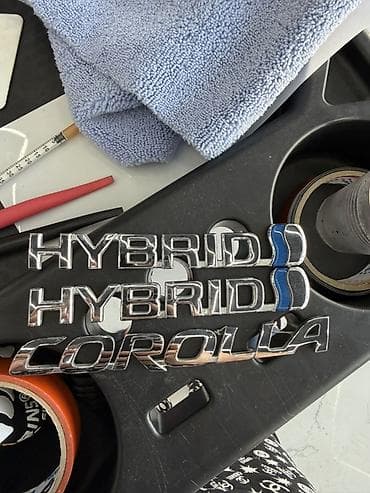 Надписи-эмблемы для автомобиля Toyota: - HYBRID (2 шт.) — at lalafo.kg Надписи-эмблемы для автомобиля Toyota: - HYBRID (2 шт.) —