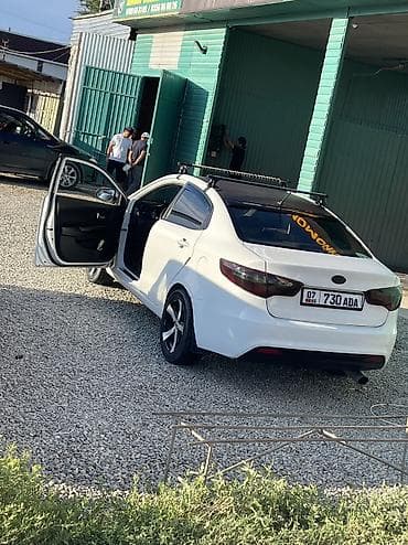 Продажа авто: Kia Rio: 2014 г., 1.6 л, Автомат, Газ, Седан — 5