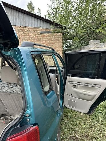Продажа авто: Mazda Demio: 1999 г., 1.3 л, Механика, Хэтчбэк — 7