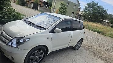 круглый: Daihatsu : 2003 г., Хэтчбэк — 5