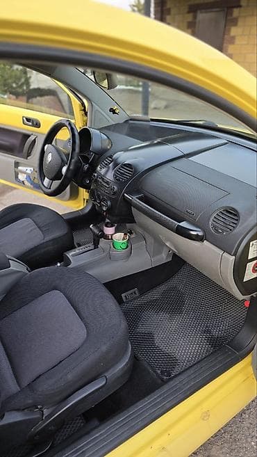 авто под: Volkswagen Bettle: 2005 г., 2 л, Автомат, Бензин, Хэтчбэк — 7