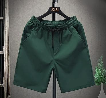 шорты мужской: Мужские однотонные шорты до колена - Модели: темно‑синие, зеленые — 2