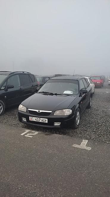 Mazda Familia: 2000 г., Универсал