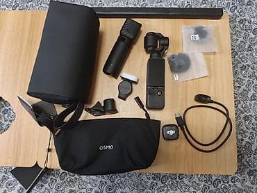 фото видео: DJI Osmo Pocket 4 Creator Combo — карманная 3-осевая — 2