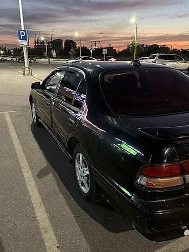 справа: Nissan Cefiro: 1996 г., 2 л, Бензин, Седан — 3