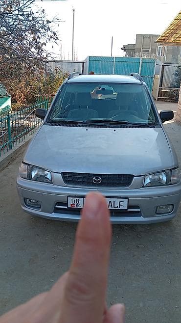 sprinter 2003: Mazda Demio: 1999 г., 1.3 л, Механика, Бензин, Универсал — 1