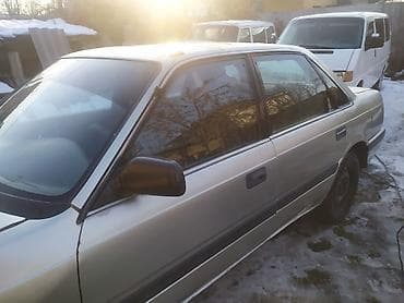 стартер авто: Mazda 626: 1989 г., 0.2 л, Механика, Седан — 2