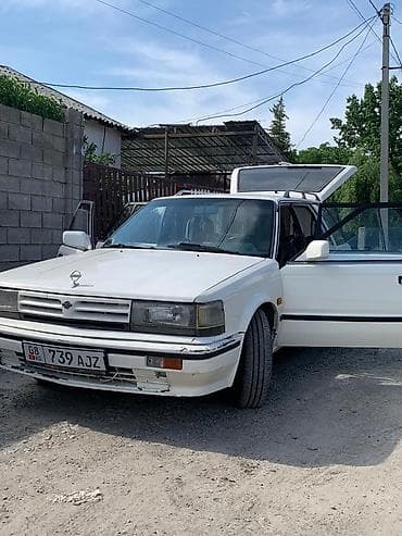 бмв 525 e34: Nissan Bluebird: 1990 г., Механика, Бензин, Универсал — 3