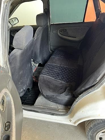 210 cdi: Daewoo Nexia: 1997 г., Седан — 8