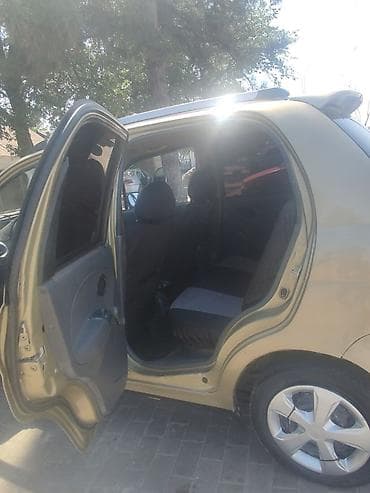 а 10 с: Аренда с Выкупом Daewoo Matiz, 2010 г., хэтчбек 5‑дверный, золотистый — 7