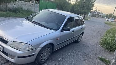 шевролет монзо: Mazda 323: 1999 г., 1.5 л, Механика, Бензин, Хэтчбэк — 4