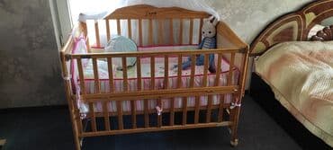 трёх ярусные кровати: Детская кроватка б/ у .Продам с бортиками и одеялом . также имеется — 3