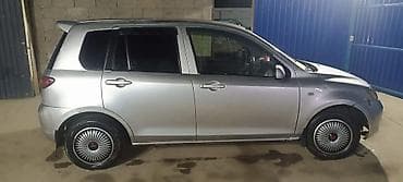 глушитель нексия 2: Mazda Demio: 2004 г., Автомат, Хэтчбэк — 2