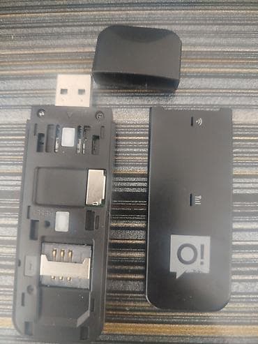 tp link m7200: 3G/4G USB‑модем с поддержкой SIM - Форм‑фактор: USB‑модем, съёмная — 1