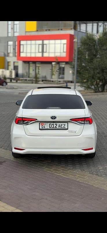 corolla 2004: Toyota Corolla: 2023 г., 1.8 л, Вариатор, Гибрид, Седан — 2