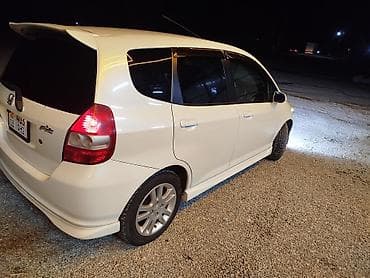 Транспорт: Honda Fit: 2002 г., 1.3 л, Вариатор, Бензин, Седан — 7