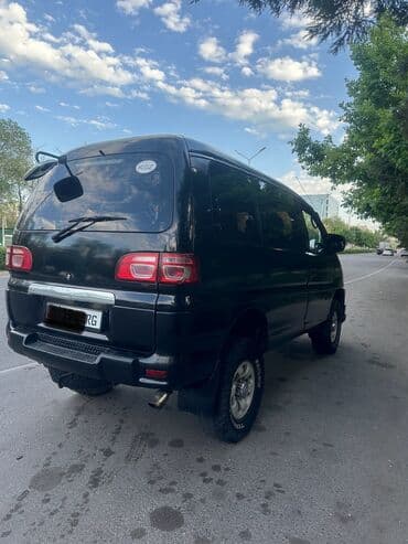 мицубиси делика левый руль бу купить: Mitsubishi Delica: 2002 г., 3 л, Автоматические, Бензин, Минивэн — 6