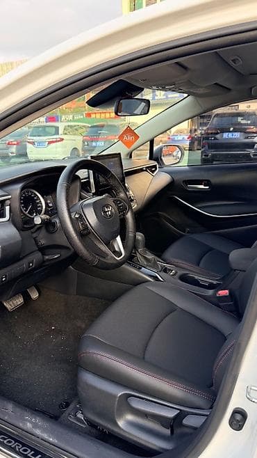 Toyota Corolla: 2022 г., 1.8 л, Автомат, Гибрид, Седан — 4