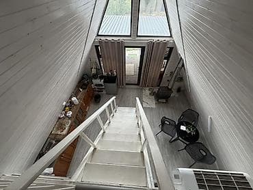 финский дом: Каркасный дом A-Frame с большой крытой террасой — 8
