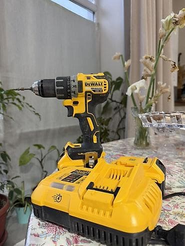 дюбель пистолет: Аккумуляторная дрель-шуруповёрт DeWALT XR, бесщёточный двигатель — 1