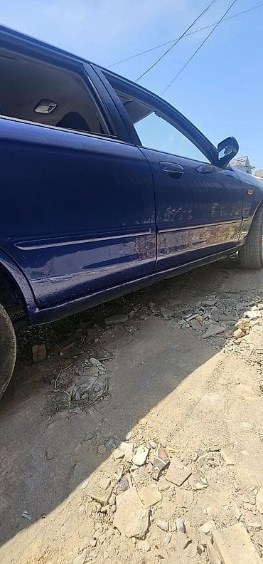 вентилятор матиз: Mazda 323: 2003 г., 1.6 л, Механика, Хэтчбэк — 6